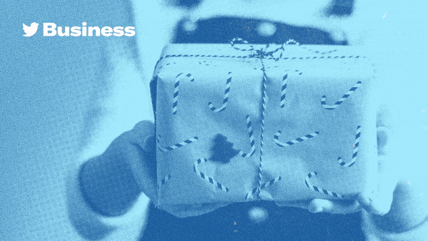 Woman holding gift wrapped in candycane paper